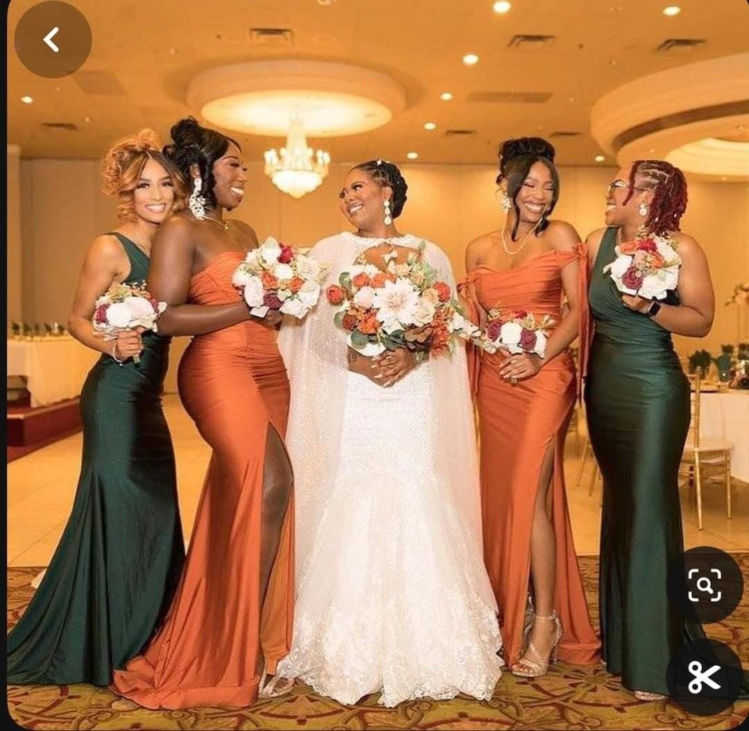 9 Champagne and Green Wedding Ideas for Every Detail 3 Five women in formal dresses posing together, including a bride and bridesmaids in green and orange.