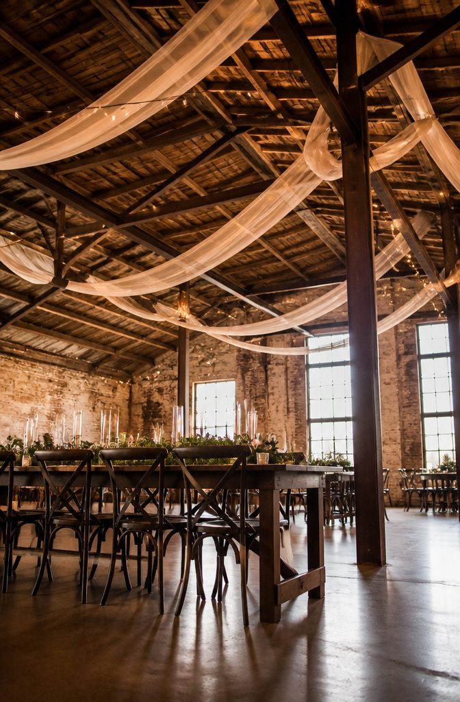 10 Vintage Wedding Venues in Indiana for a Classic Celebration 3 Exposed brick and timber interior of Biltwell Event Center in Indianapolis.